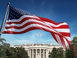 United States flag in front of White House